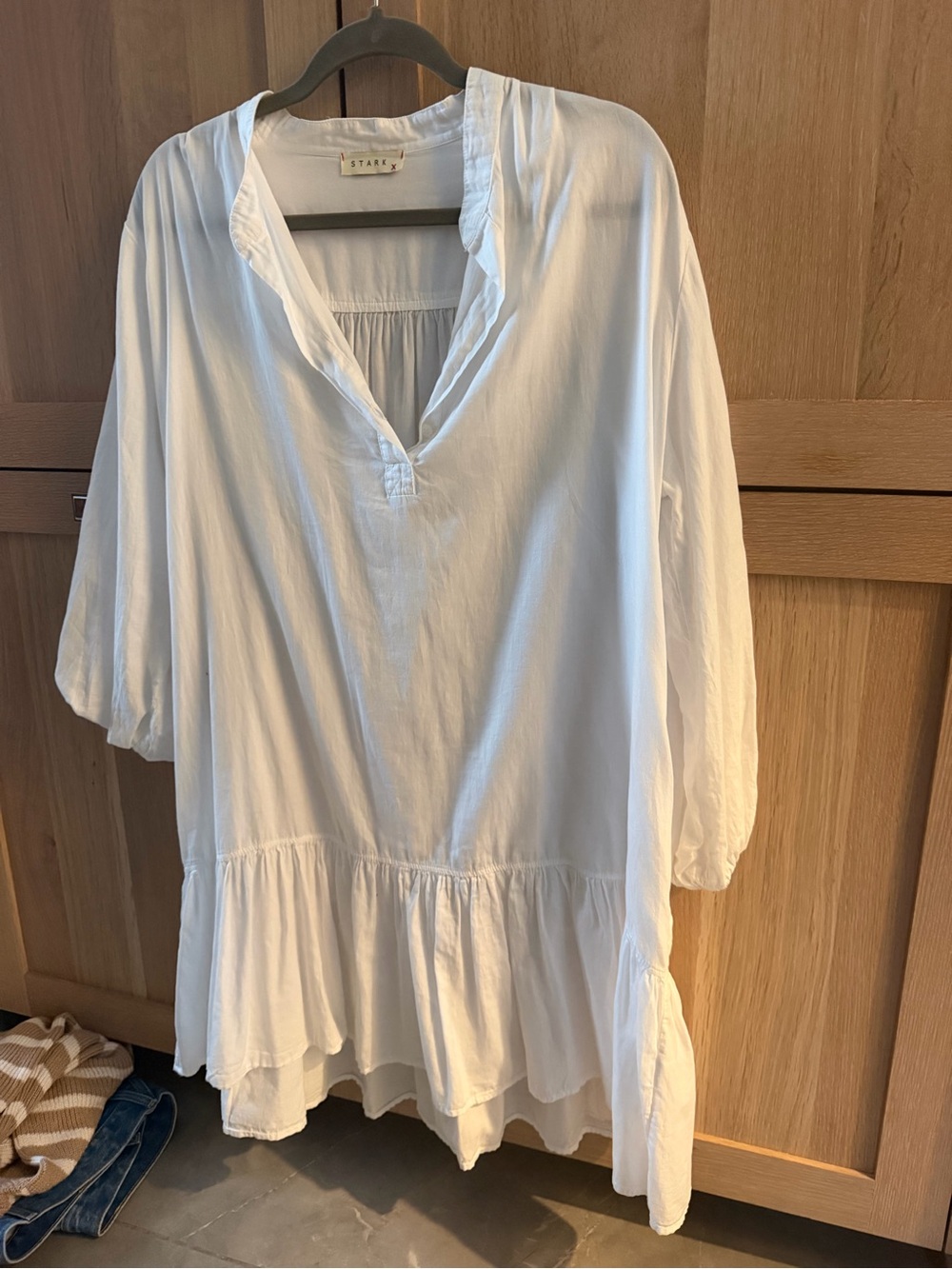 Starck White V-Neck Ruffle Hem Tunic Dress